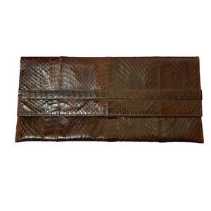 Crocodile-embossed clutch